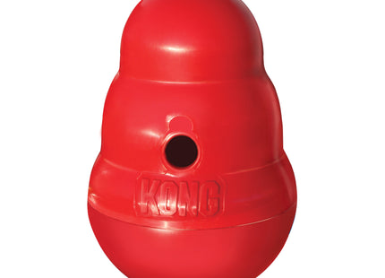 Een rood Kong - Wobbler Snack Dispenser-speeltje met een gat in het midden, dat fungeert als snackdispenser voor voer.