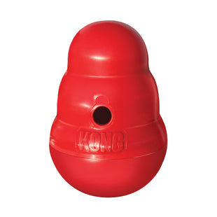 Een rood Kong - Wobbler Snack Dispenser-speeltje met een gat in het midden, dat fungeert als snackdispenser voor voer.