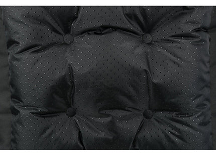 Een close-up afbeelding van een Trixie - Autostoel gemaakt van polyester.