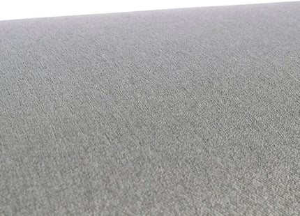 Een close-up van een grijze stoffen poef, met het Trixie - Hondenmatras CityStyle - Home Edition-ontwerp.