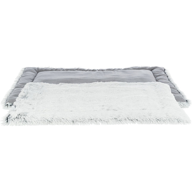 Een comfortabel Trixie - Ligmat Harvey bed, gemaakt van ligmat nepbont, op een witte achtergrond.