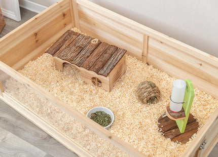 De Trixie - Indoor Knaagdierverblijf is een houten kooi speciaal ontworpen voor cavia's. Het beschikt over een houten brug en een kom met hooi voor een comfortabel verblijf