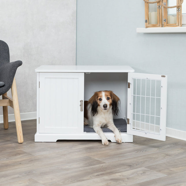 Een Trixie - Bench / Home Kennel zit in een hondenbench.